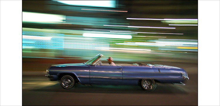 blue car, red hat || canon digital rebel | 1/4s | f4.5 | ISO 800