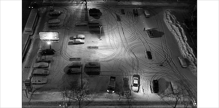 snowy parking lot || digital rebel | 1/10s | F3.5 | ISO 400